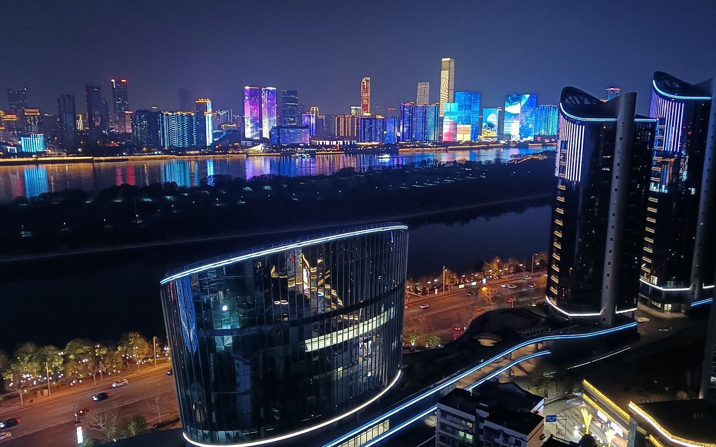 Night view of the Xiang River and the illuminated skyline, Changsha, China