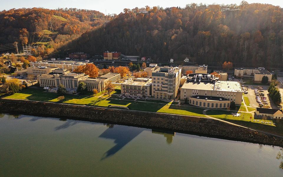 The University of Charleston’s riverfront campus on the Kanawha River in Charleston, West Virginia, seen from above in autumn