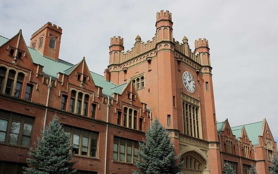 The red-brick clock tower and green roofs of the University of Idaho’s Administration Building in Moscow, Idaho